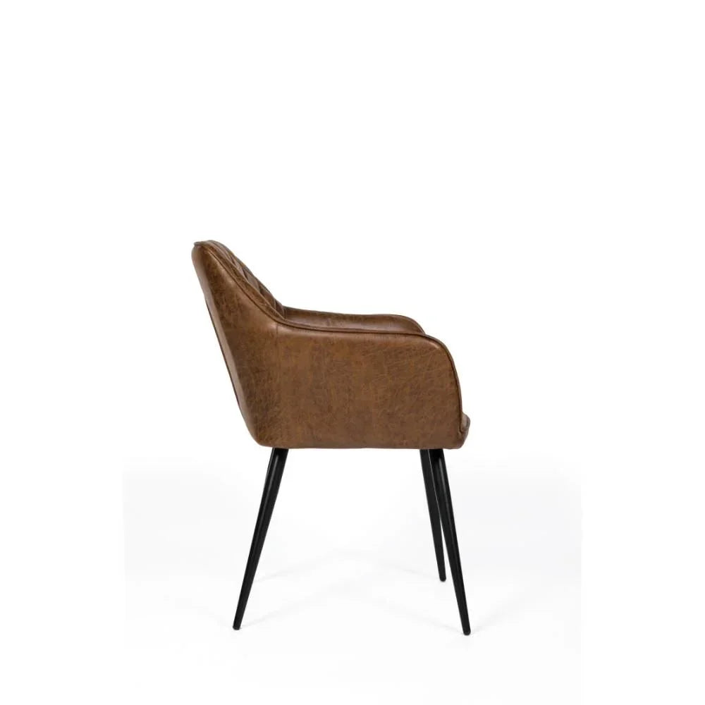 Side view of brown leather dining chair with black metal legs on white background