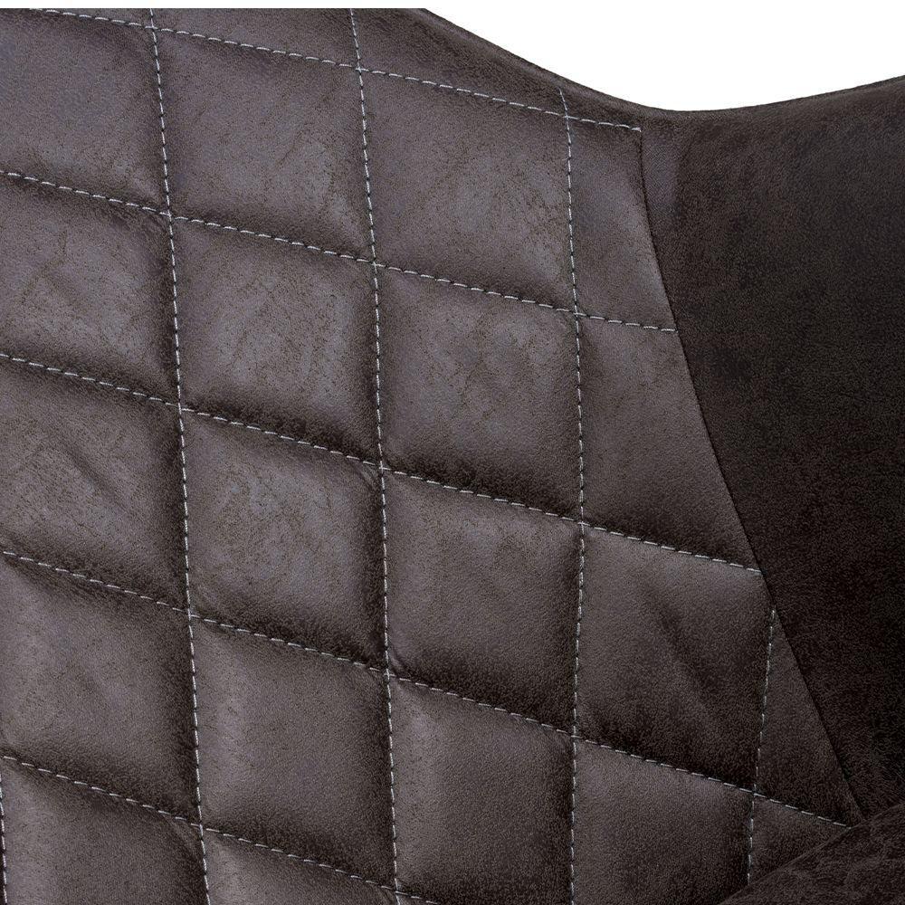 Close-up of grey dining chair with diamond stitched faux leather upholstery