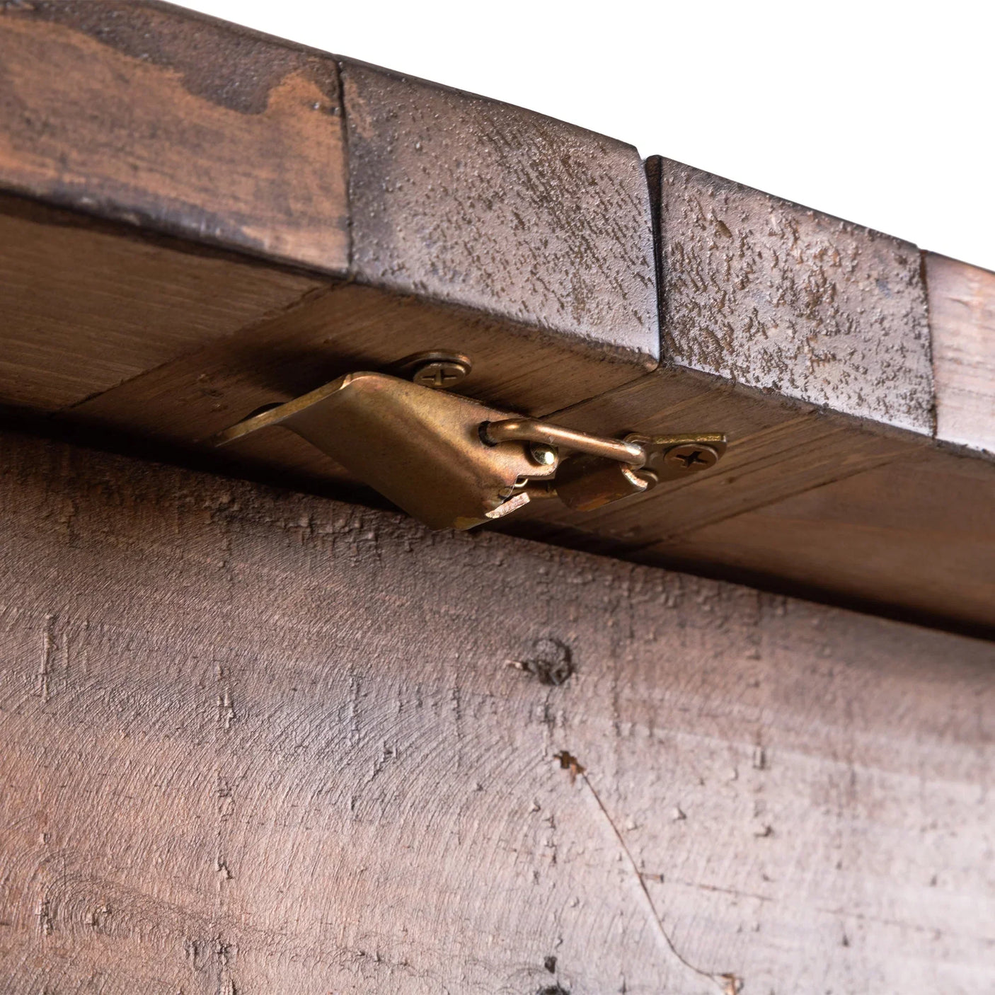Close detail of Chatsworth extending dining table wooden surface and metal locking mechanism