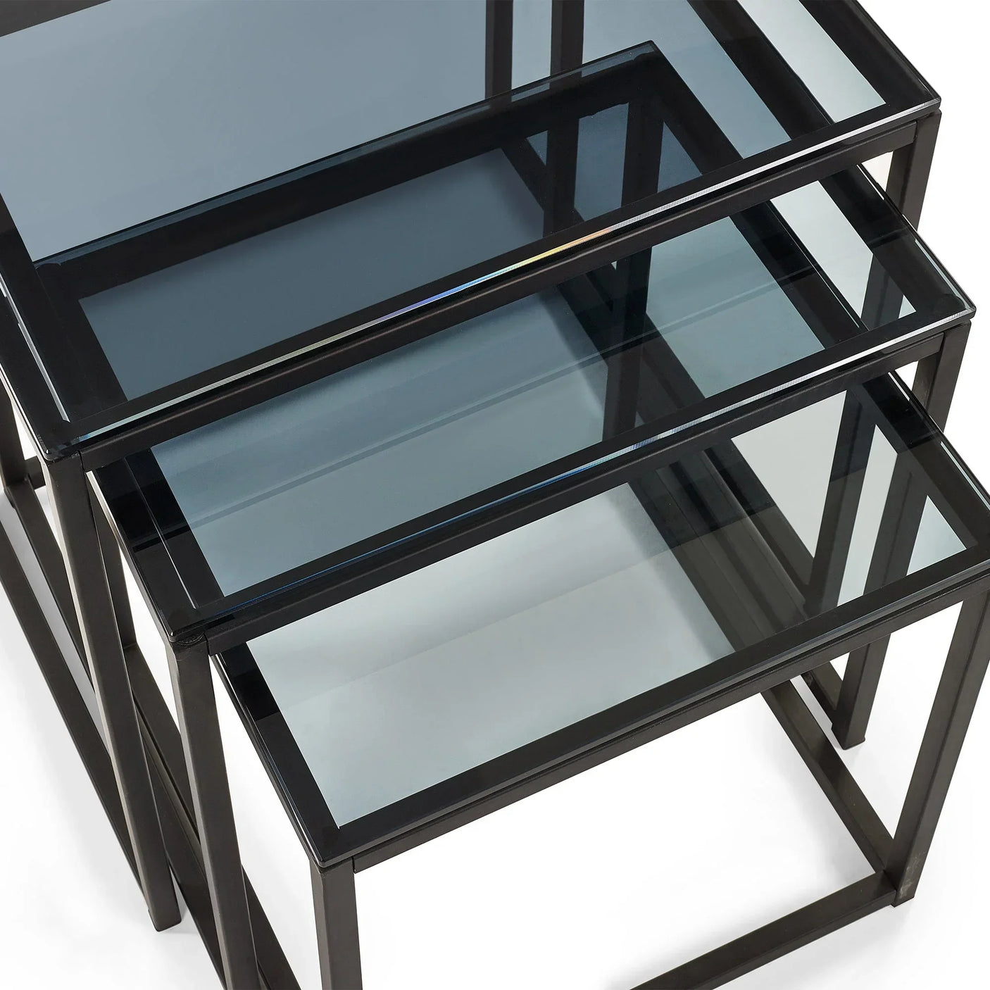 Black metal and glass nest of tables set with stacked, rectangular design