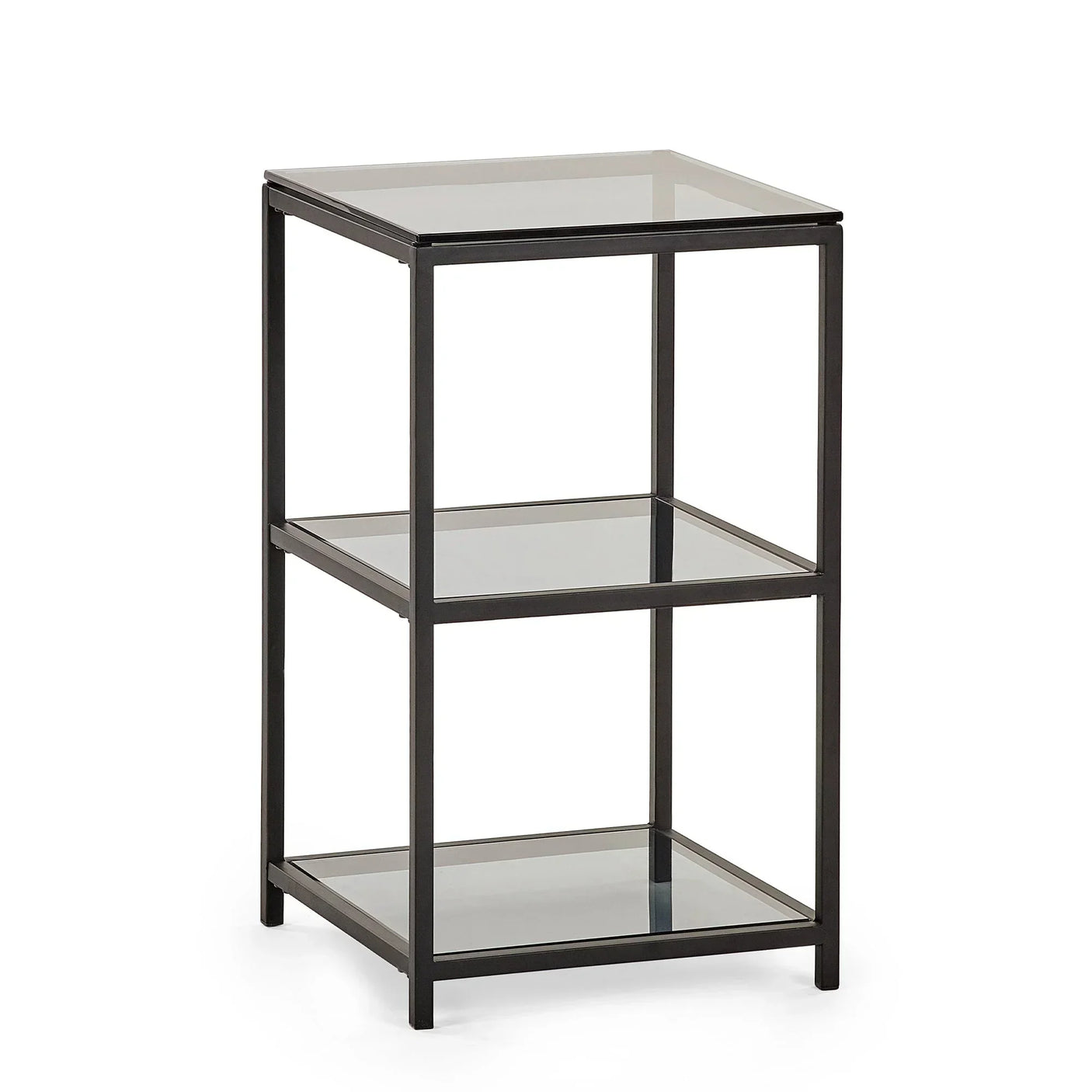 Tall narrow side table with black metal frame and three glass shelves, isolated on white