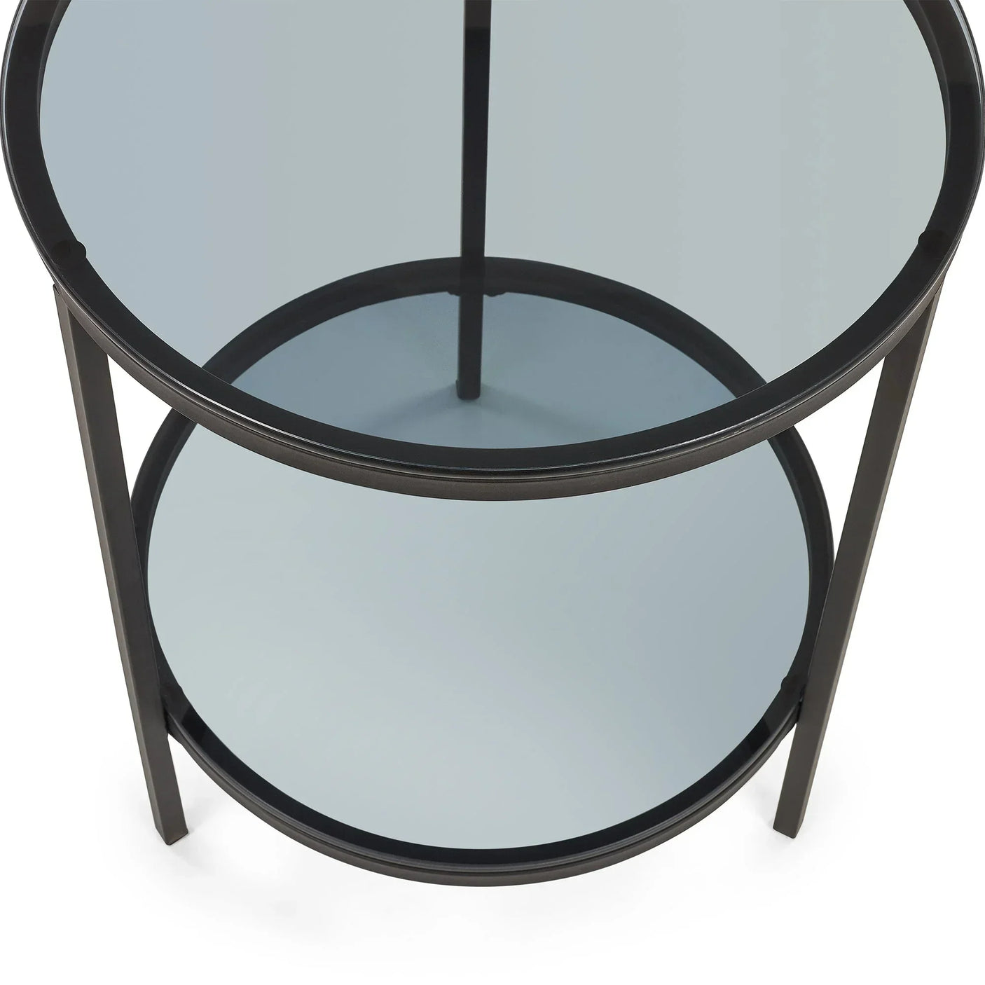Round glass lamp table with black metal frame and lower shelf, viewed from above