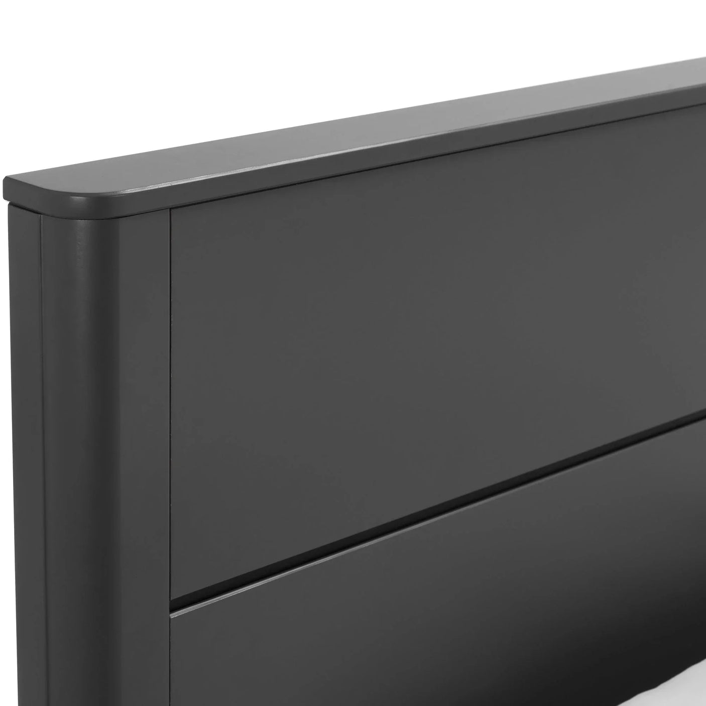 Close up of dark grey king bed headboard with smooth panel detail