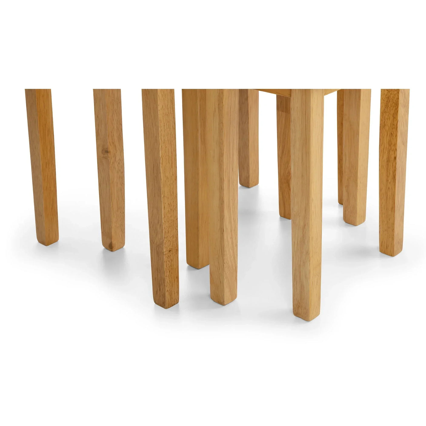 Oak nest of tables set showing wooden legs against white background