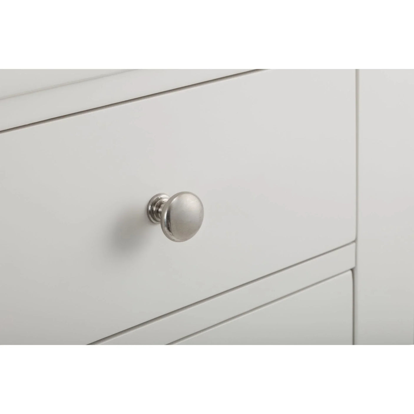 Surf white chest of drawers close-up showing silver round drawer handle and smooth finish
