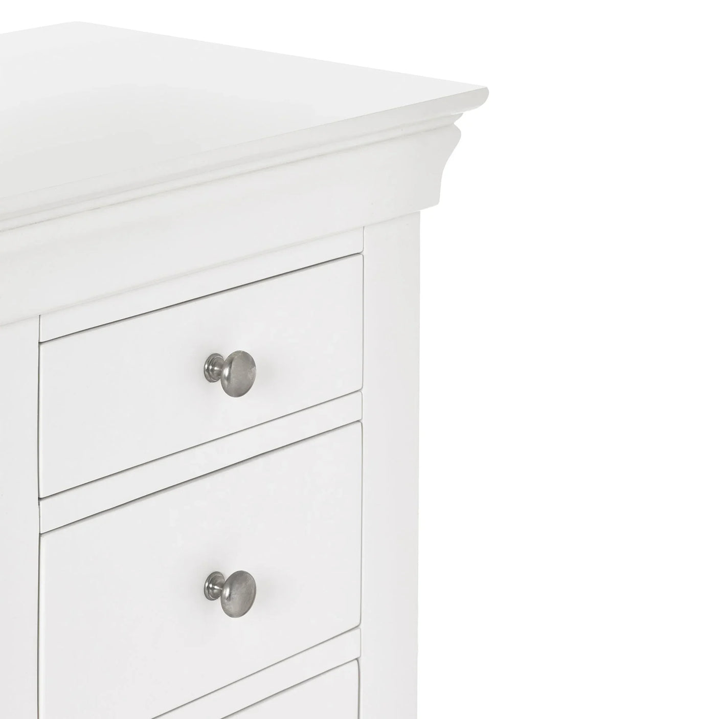 white dressing table close-up showing three drawers with metal knobs and smooth painted finish