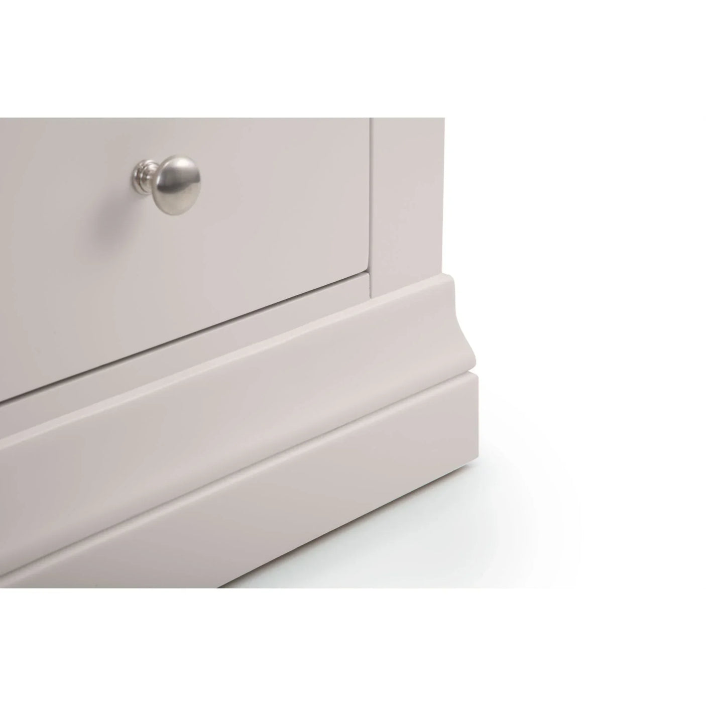 Light grey drawer chest base with metal knob and detailed plinth