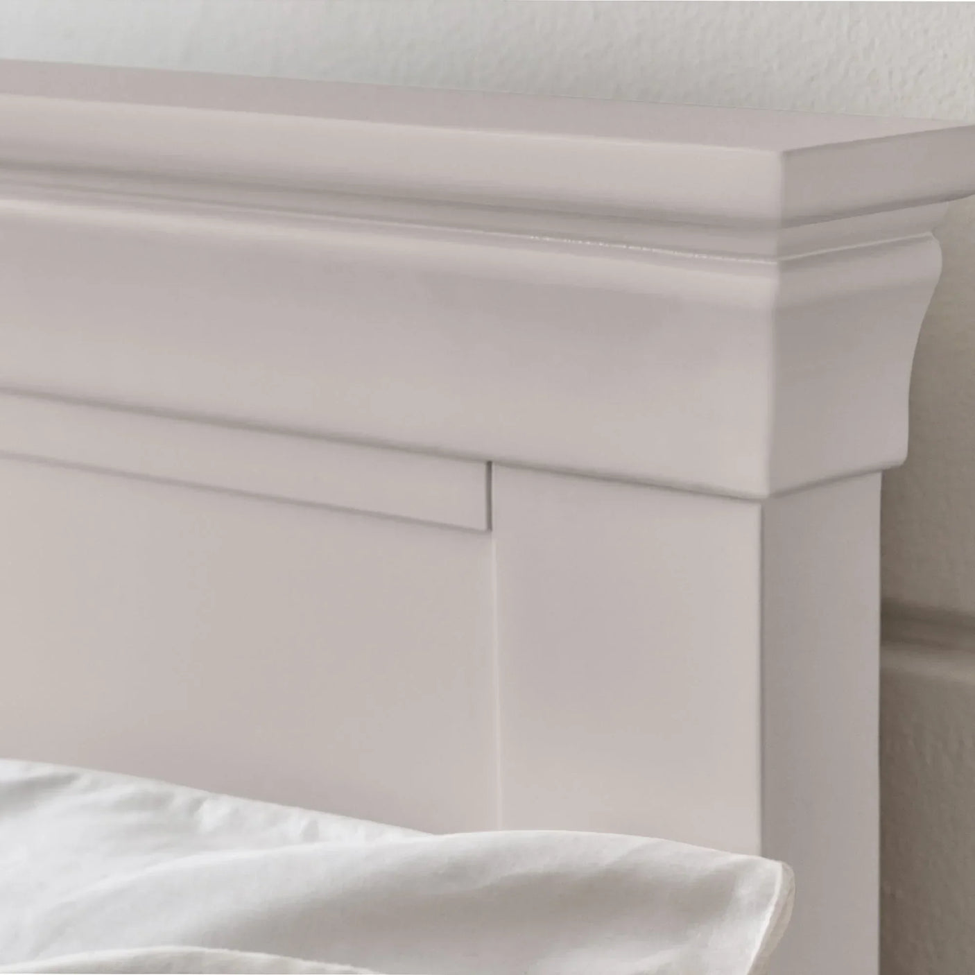 Close-up of Clermont king size grey bed headboard with smooth panel detailing