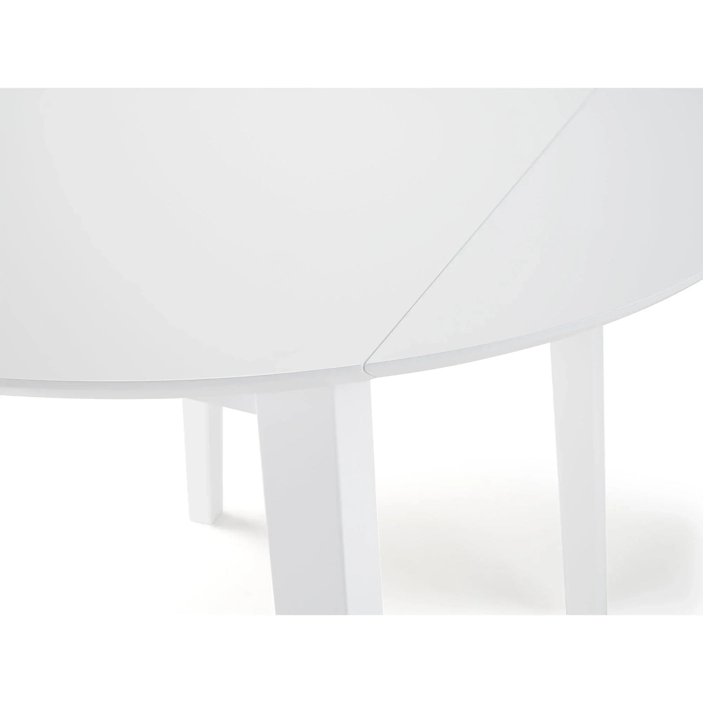 Closeup of white dropleaf dining table with visible hinge mechanism and sturdy painted legs