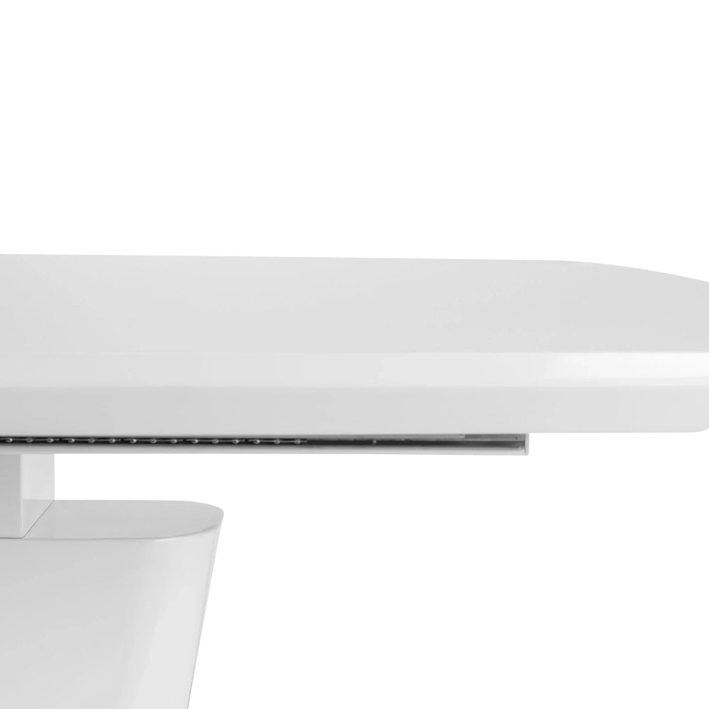 Closeup of glossy white dining table edge and modern base