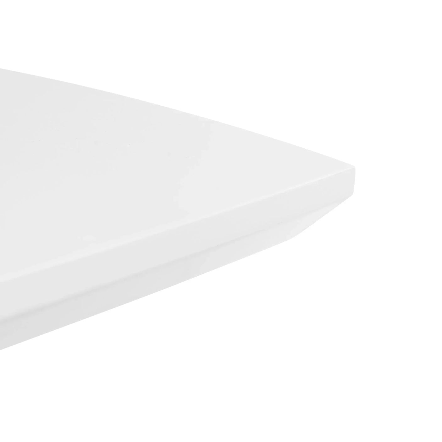 Close-up of white dining table corner with smooth, modern finish