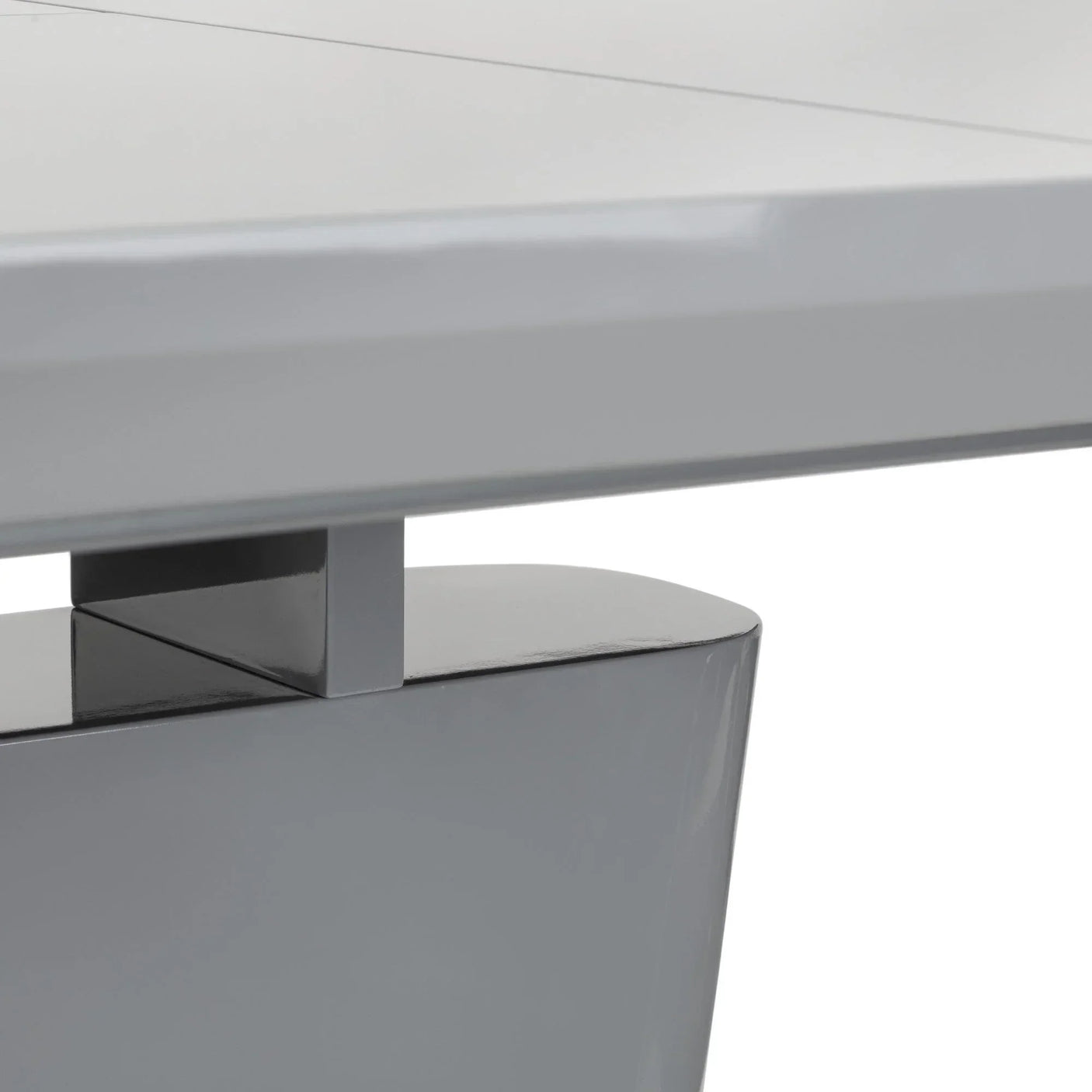 Glossy grey dining table pedestal base with modern geometric design, close-up view