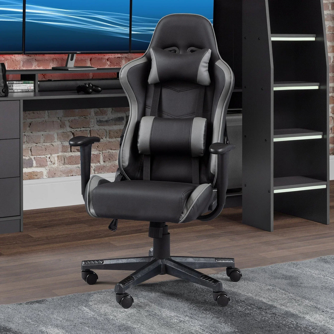 Black and grey gaming chair with headrest and lumbar support in modern home office setup