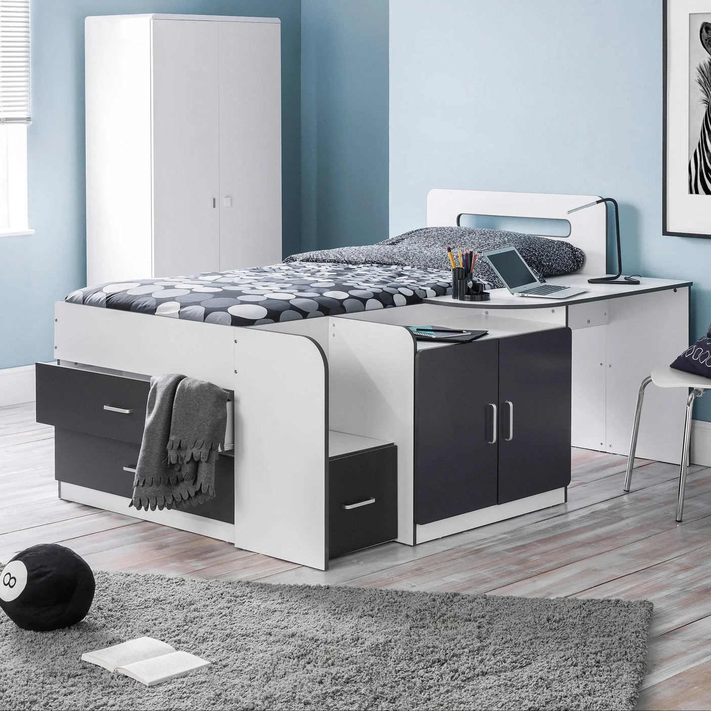 white cabin bed with built-in drawers, desk and storage in modern kids bedroom