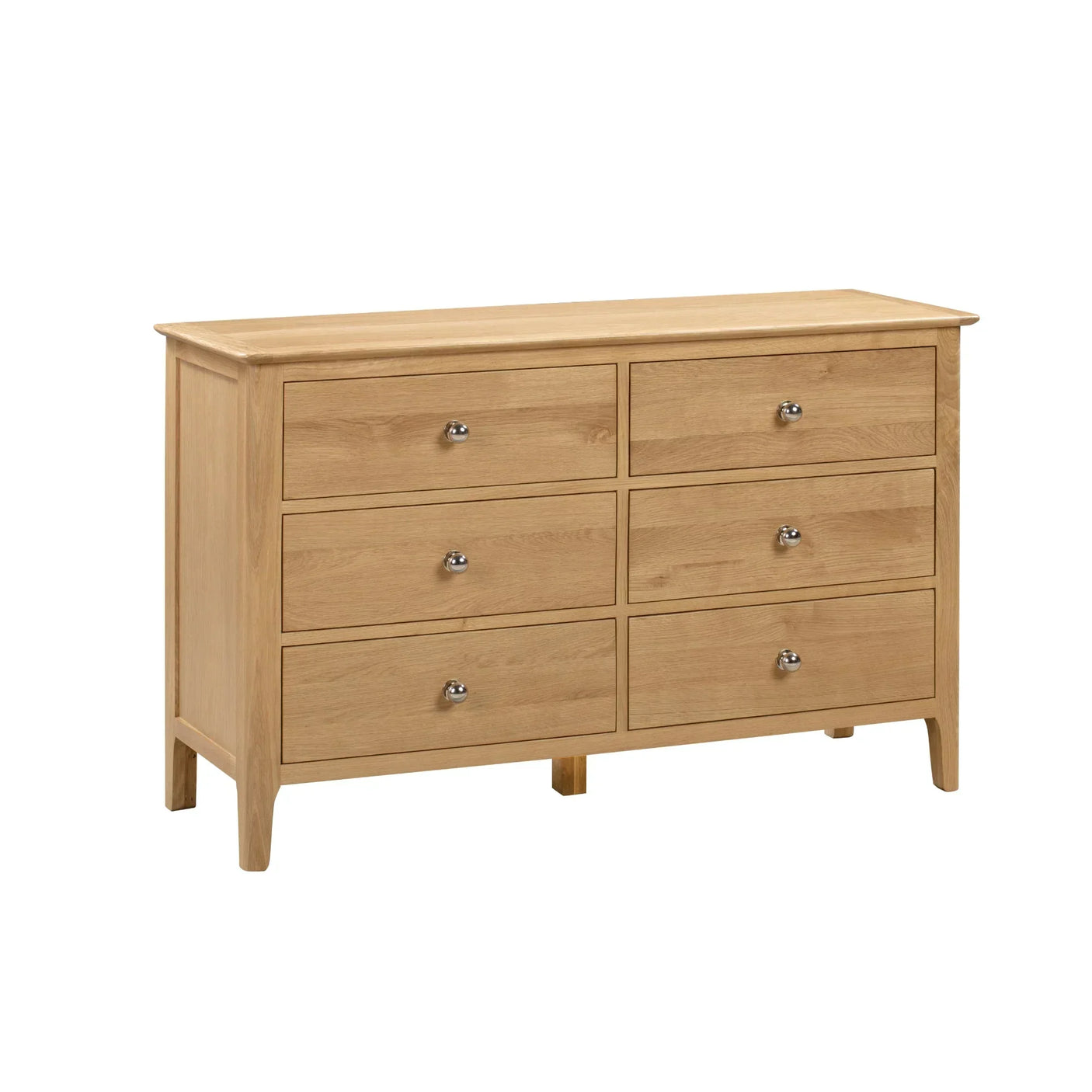 Oak wide chest of drawers with six drawers and metal handles, angled front view