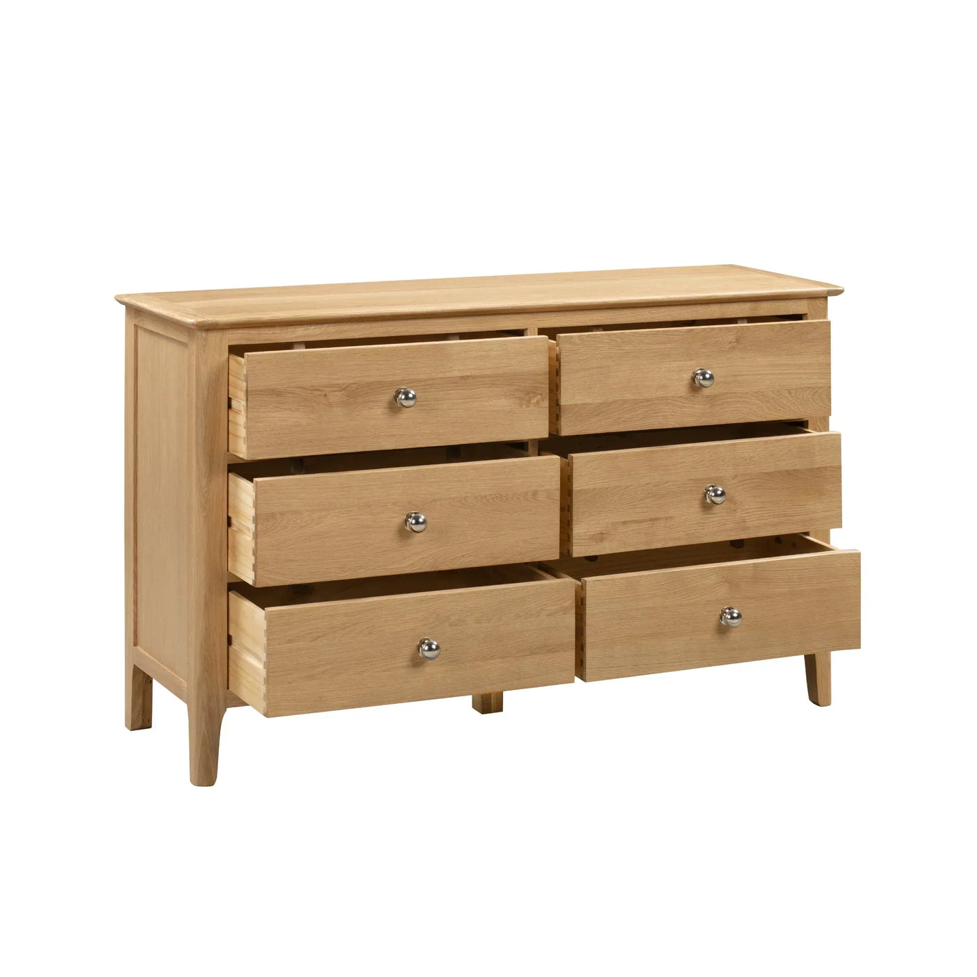 Cotswold 6 drawer wide chest in light oak finish with drawers open, angled front view