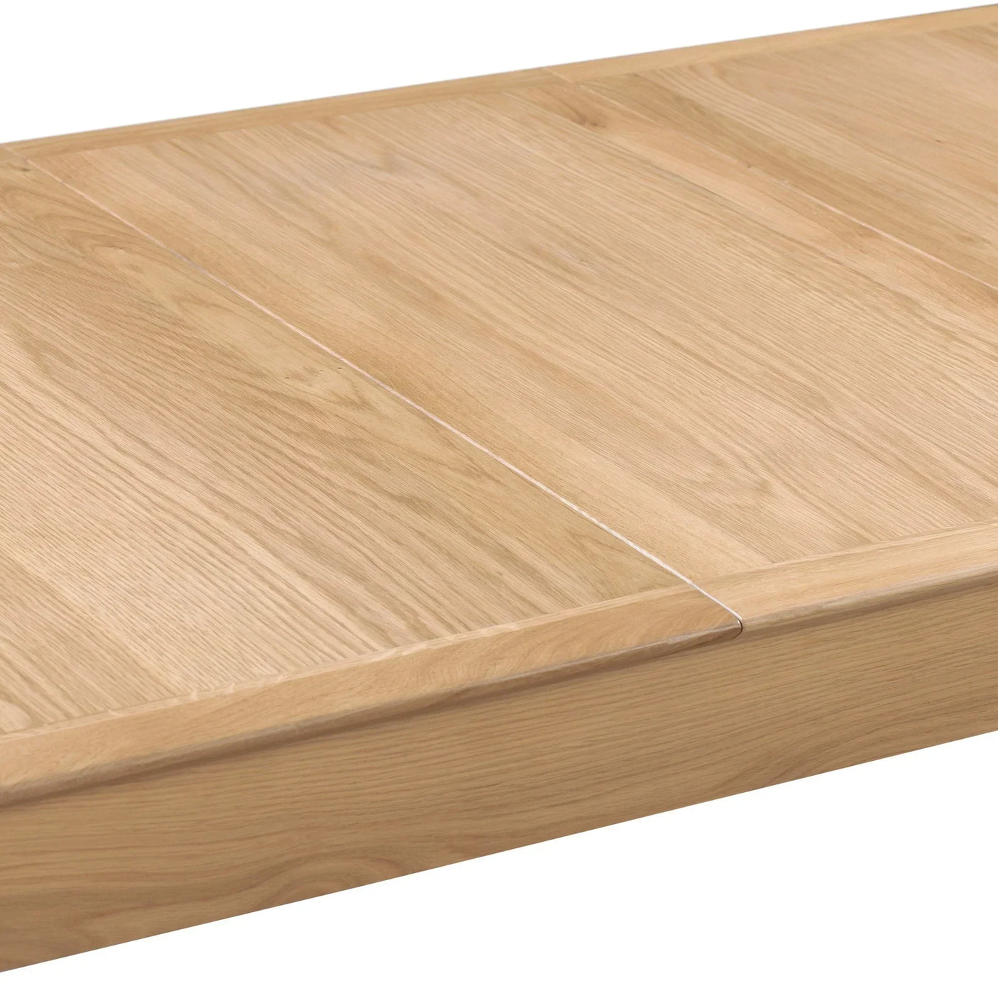 Cotswold extending dining table close-up showing oak wood grain and extension joint