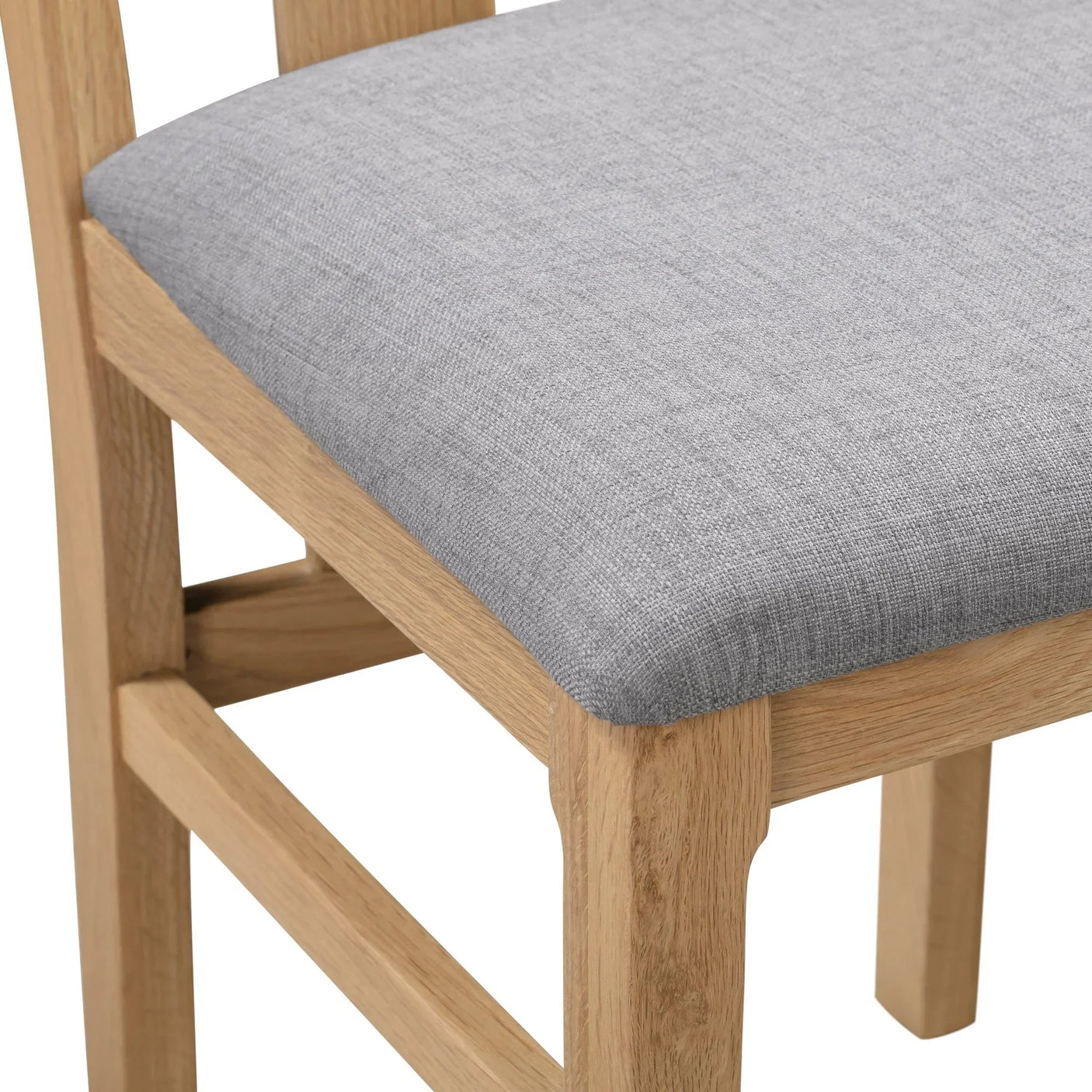 Cotswold dining chair with light oak frame and grey fabric upholstered seat close-up