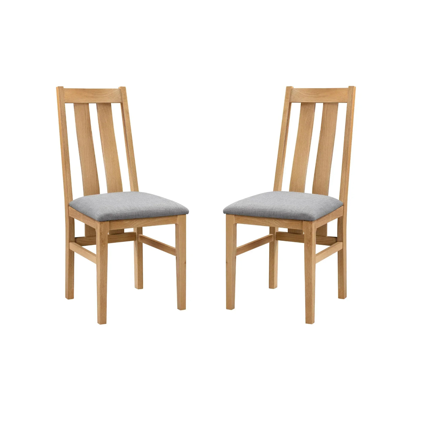 Pair of oak dining chairs with slatted backs and grey upholstered seats on white background