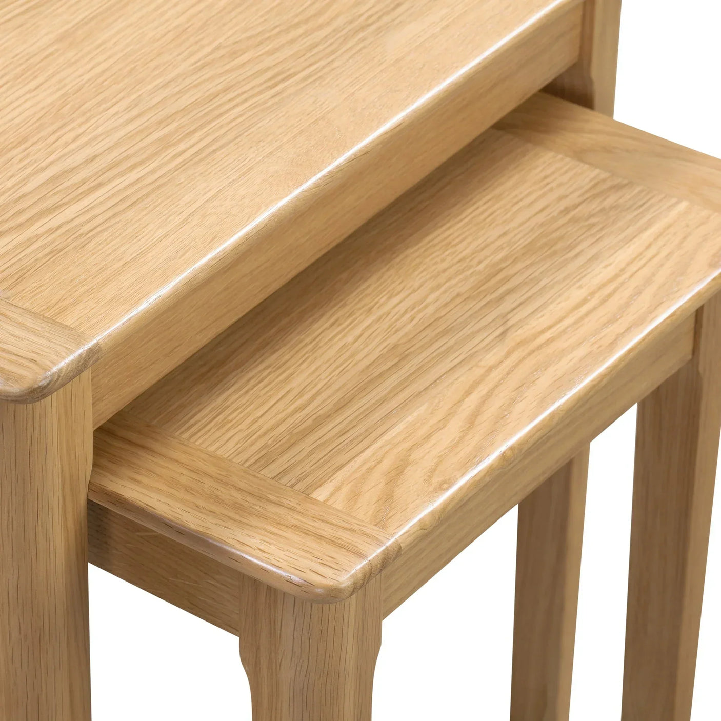 oak nest of tables close-up showing wood grain and rounded corner detail