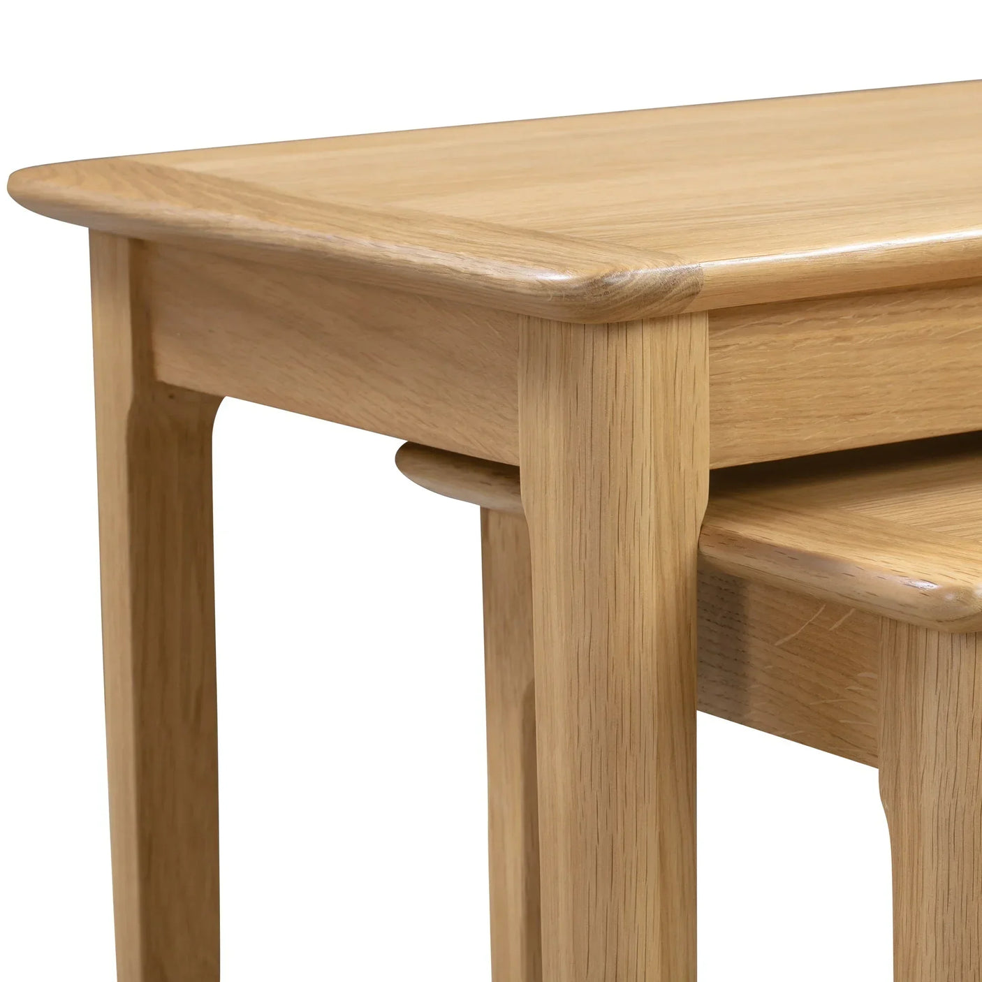 Oak nest of tables corner view showing smooth rounded edges and natural wood grain
