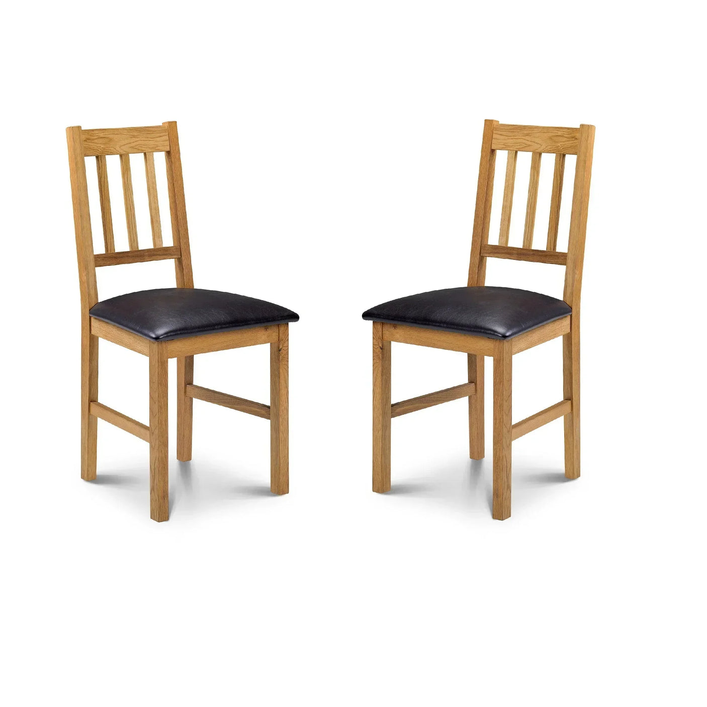 Pair of oak dining chairs with slatted backs and black padded seats on white background