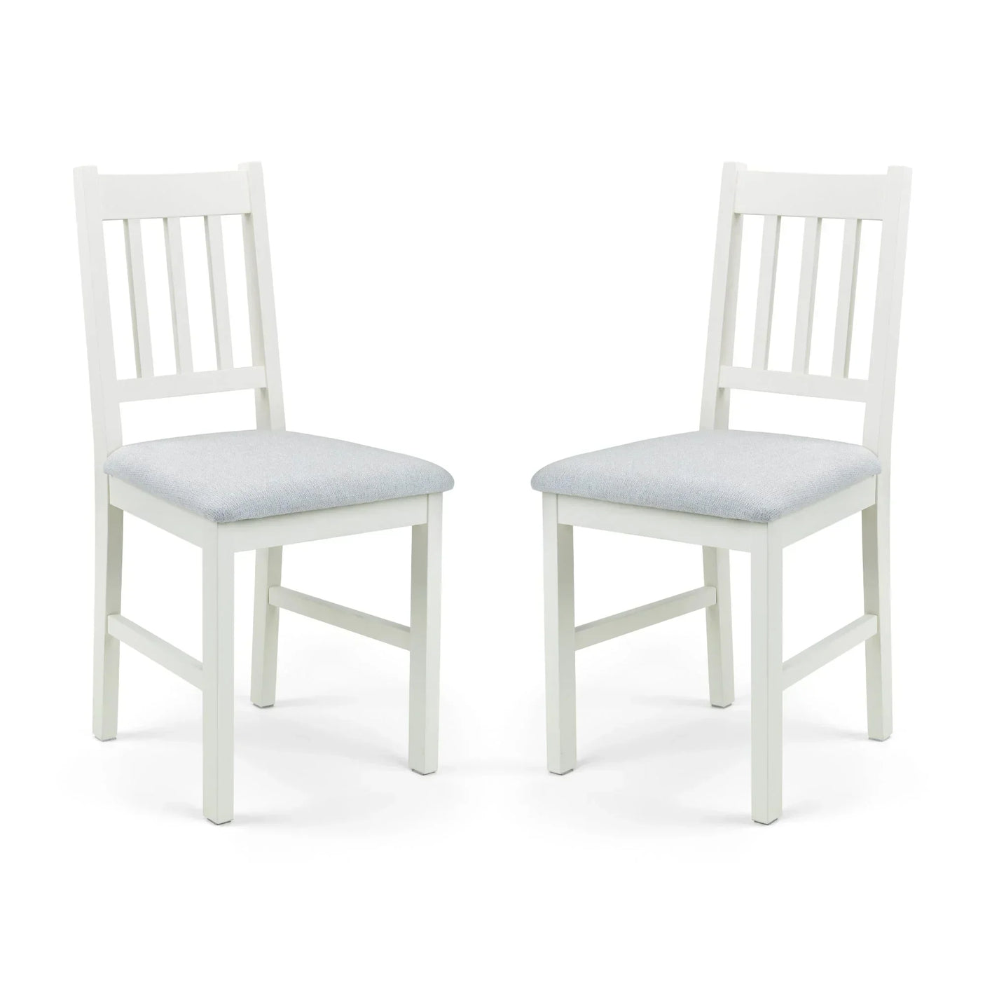 Ivory dining chair pair with cushioned seats and slatted backs on white background