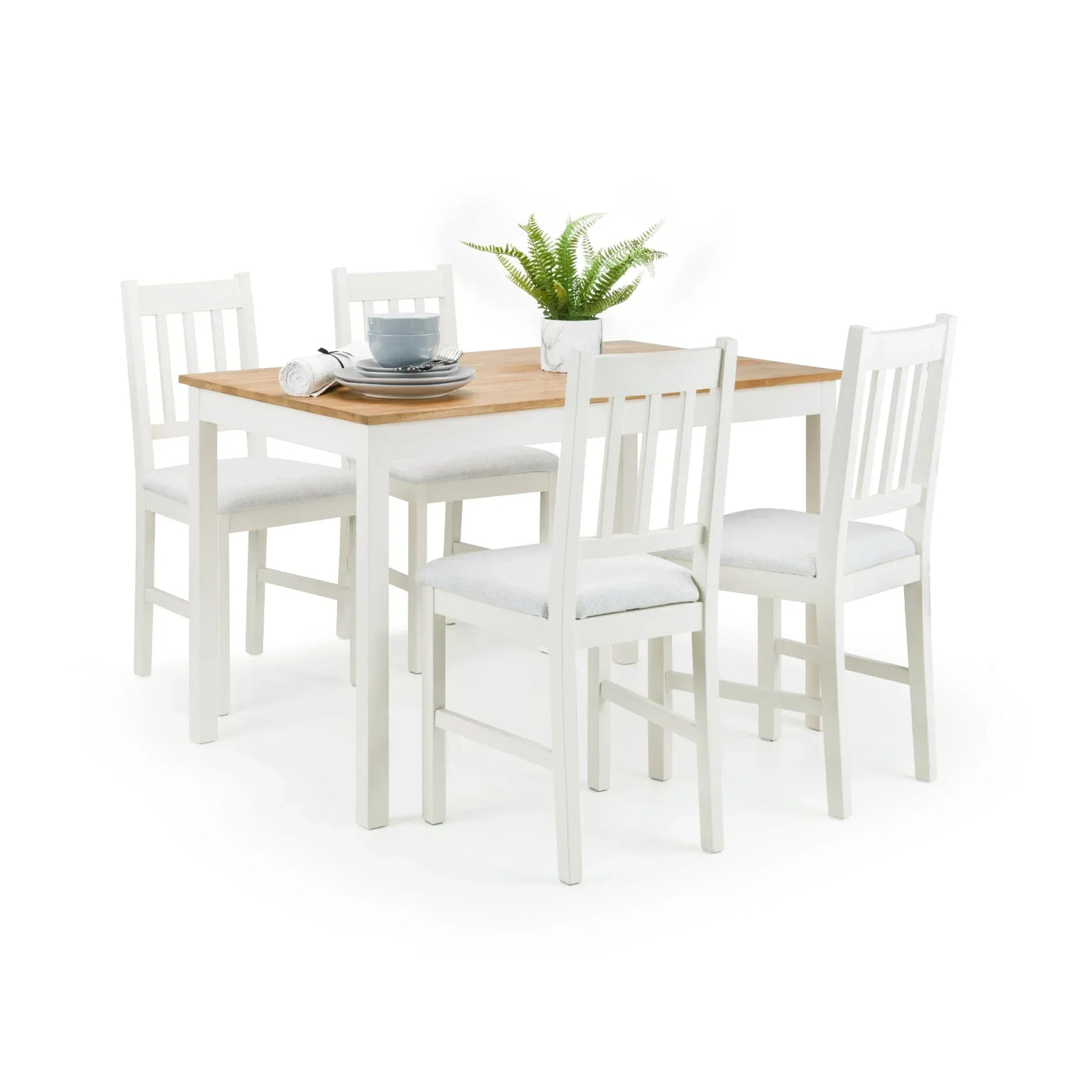 Ivory dining chair set with wooden table and cushioned seats arranged for four