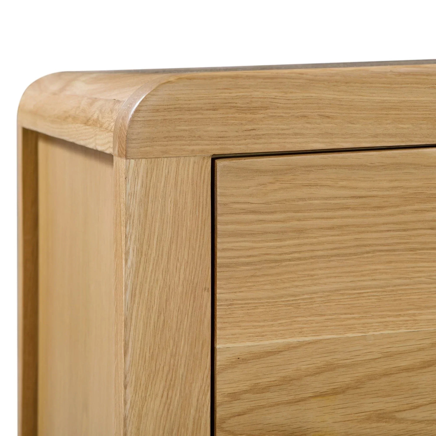 oak 3 drawer chest close-up showing curved corner and wood grain detail