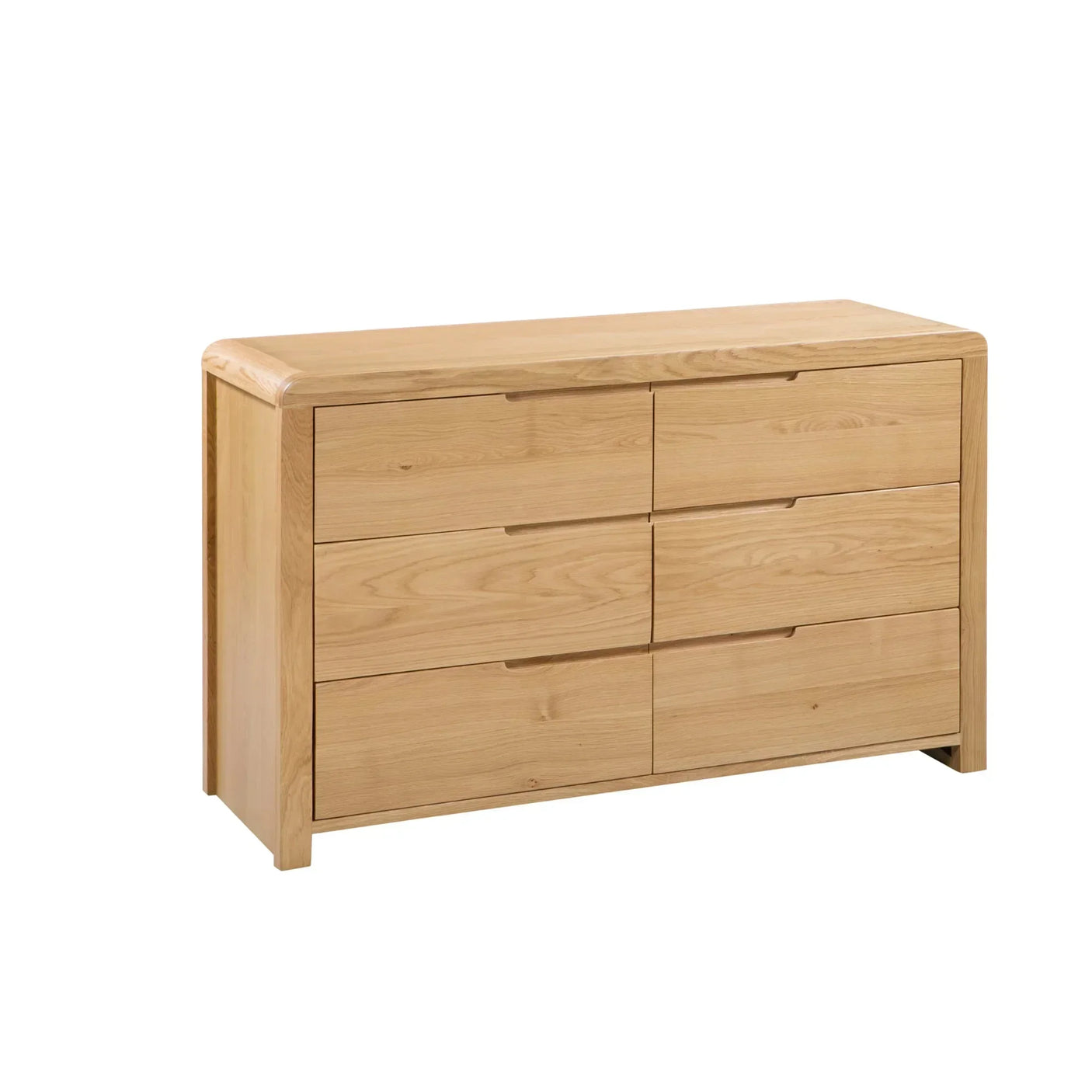 Oak wide chest of drawers with six handleless drawers and rounded corners on white background