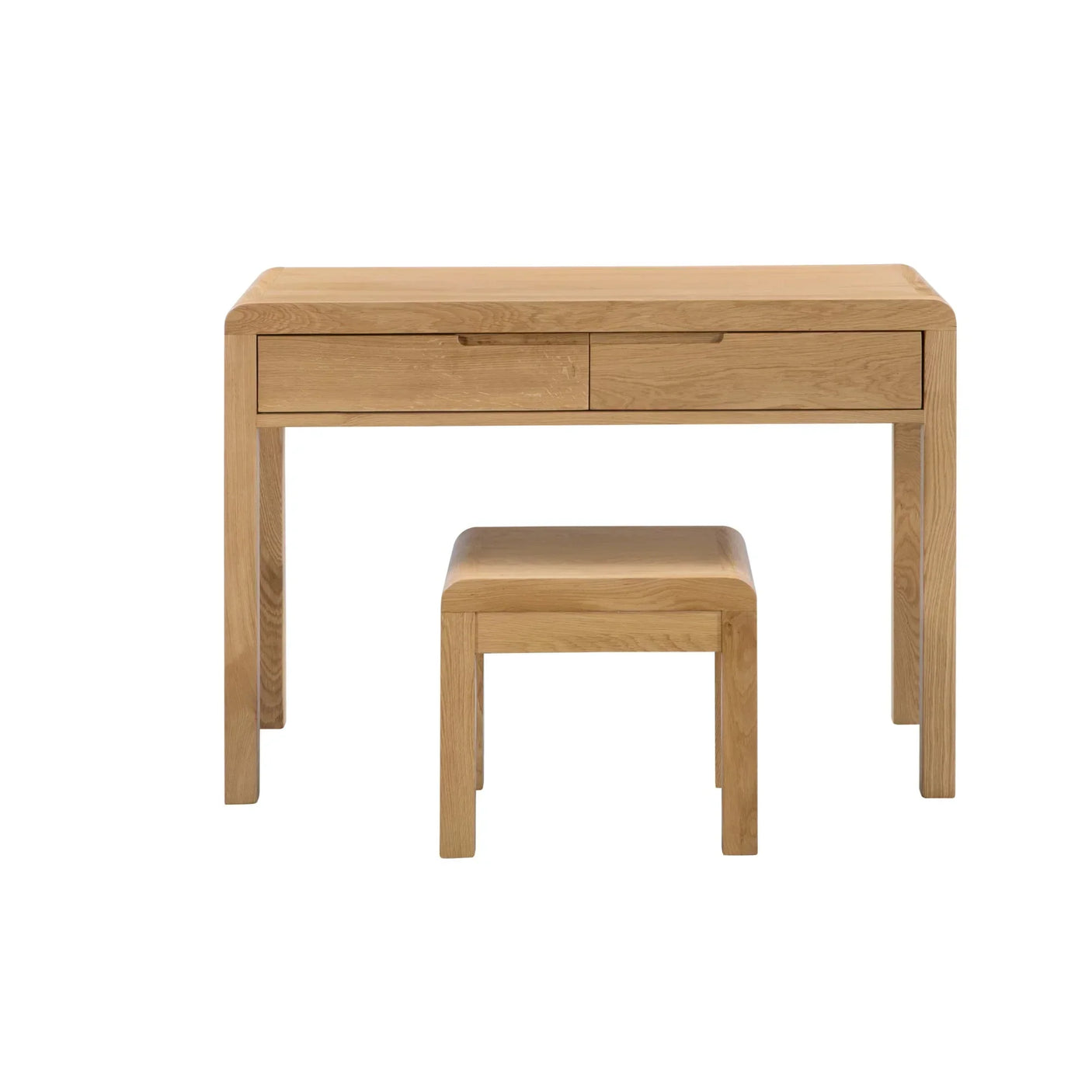 Oak dressing table with two drawers and matching stool, front view on white background