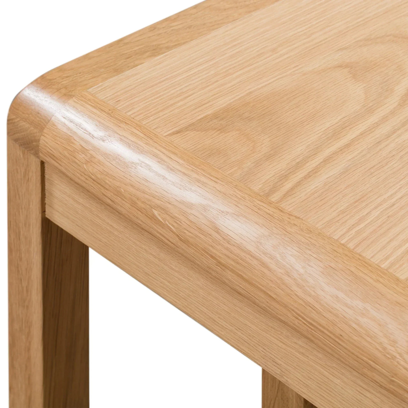 Oak nest of tables close-up showing smooth rounded corner and natural wood grain