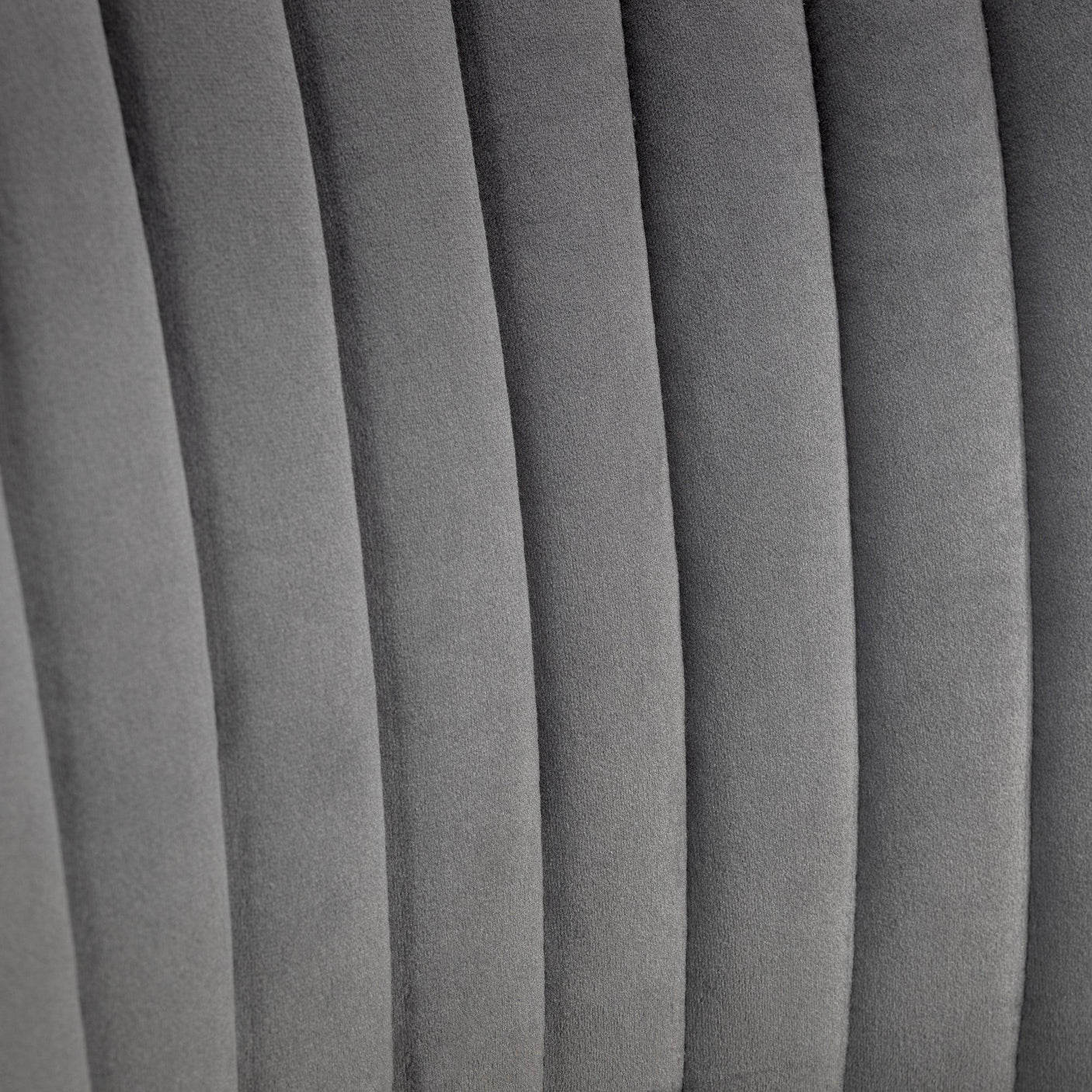 Grey Cannes chair with fabric panel detailing in close-up view