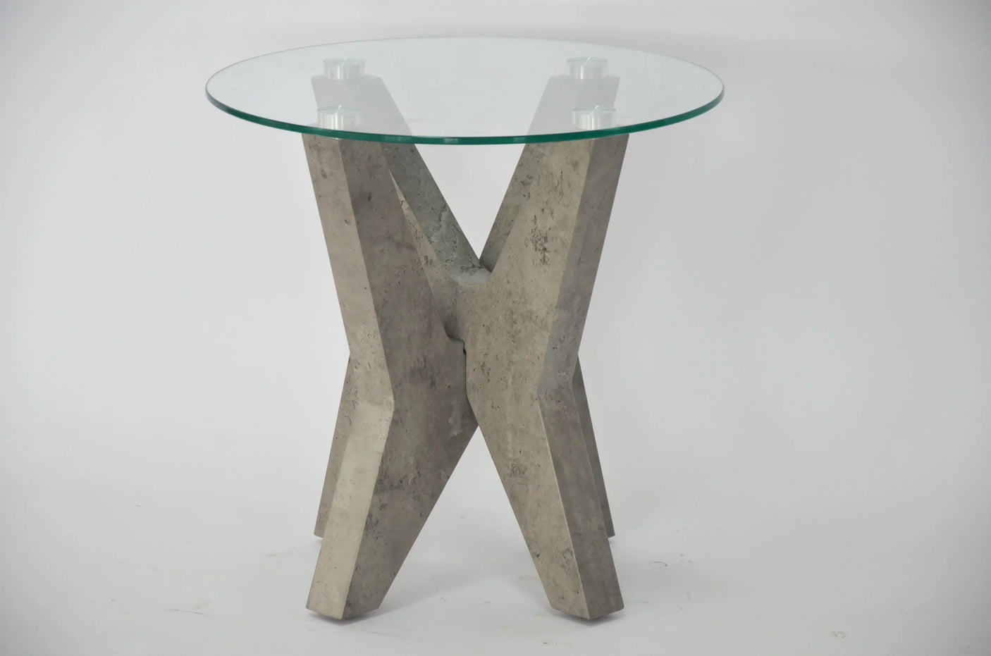 grey marble lamp table with round glass top and X-shaped concrete base