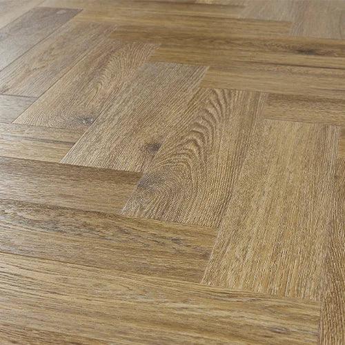 Chestnut wood effect flooring with herringbone pattern and natural grain texture