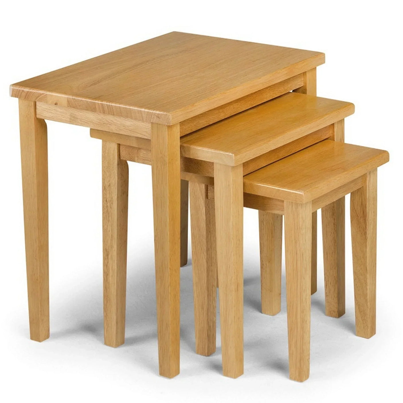 Light oak nest of tables with three rectangular tables stacked together on white background