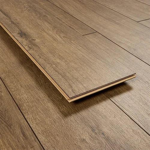Cognac oak laminate flooring plank with wood grain texture and beveled edge detail