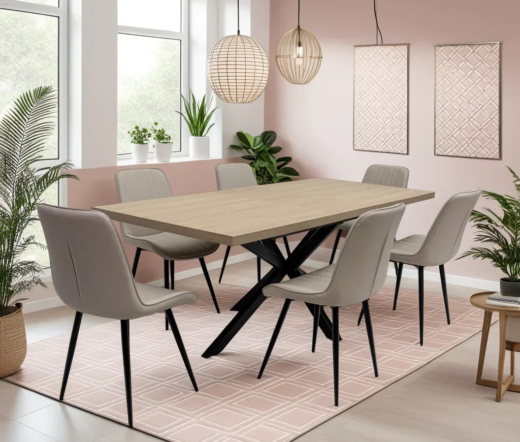 Modern dining table with light wood top and six grey chairs in pastel dining room