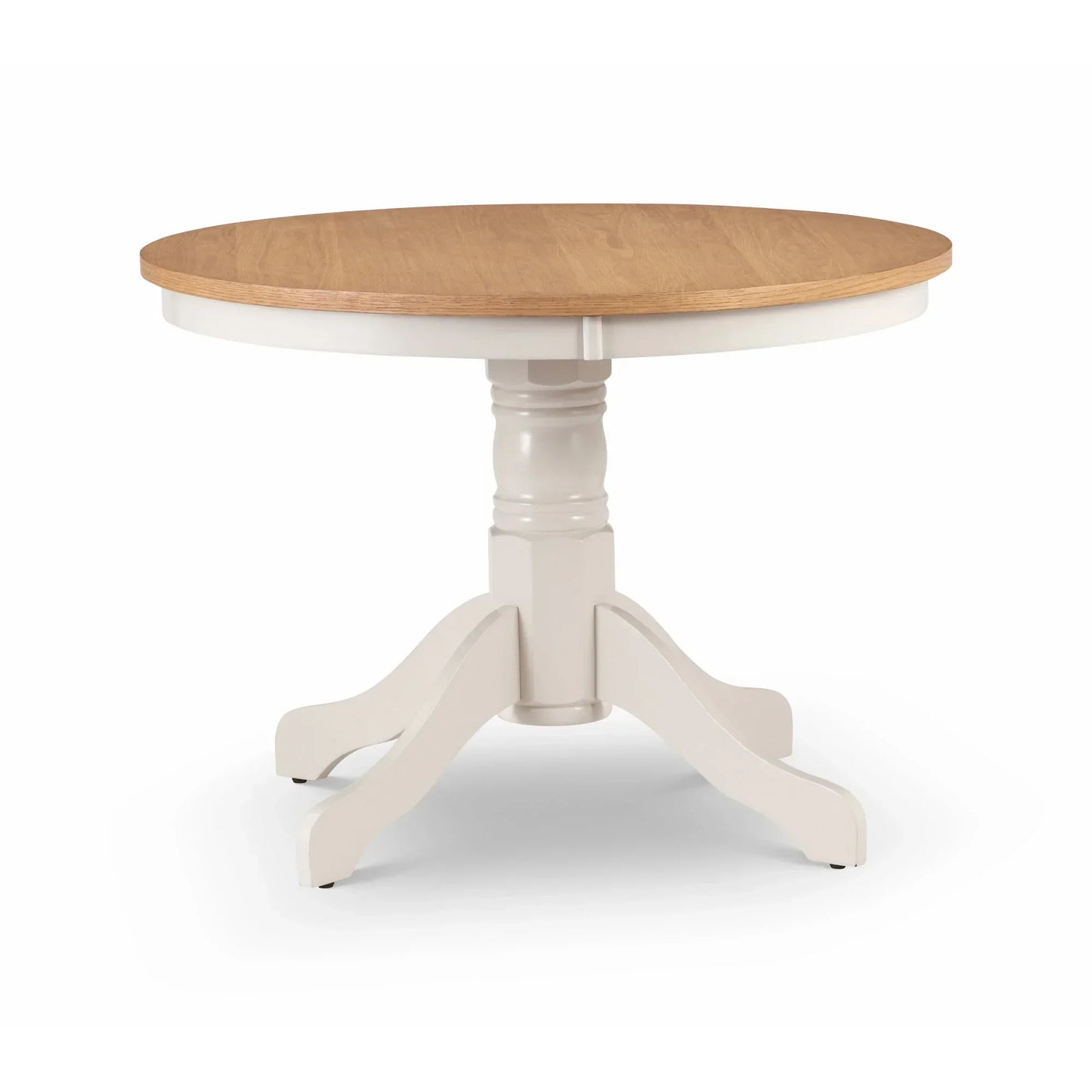 Round pedestal dining table with oak top and painted white base on white background