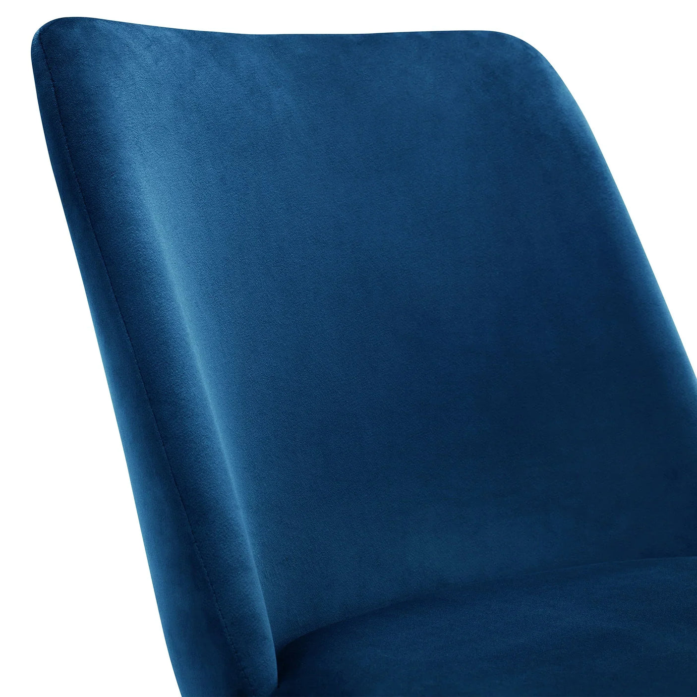 Blue velvet dining chair with smooth curved backrest closeup