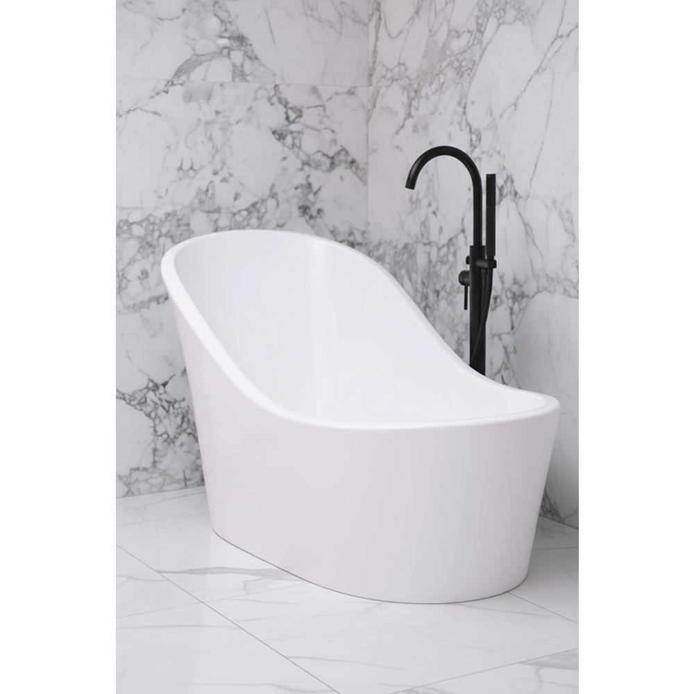 White freestanding bathtub with a black faucet against a marble wall.