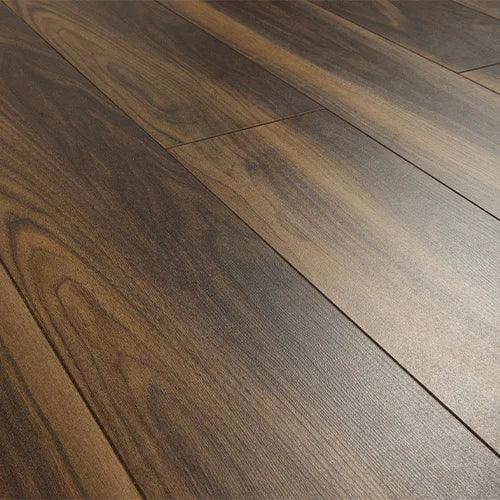 Dark walnut wood flooring planks with natural grain pattern in close view