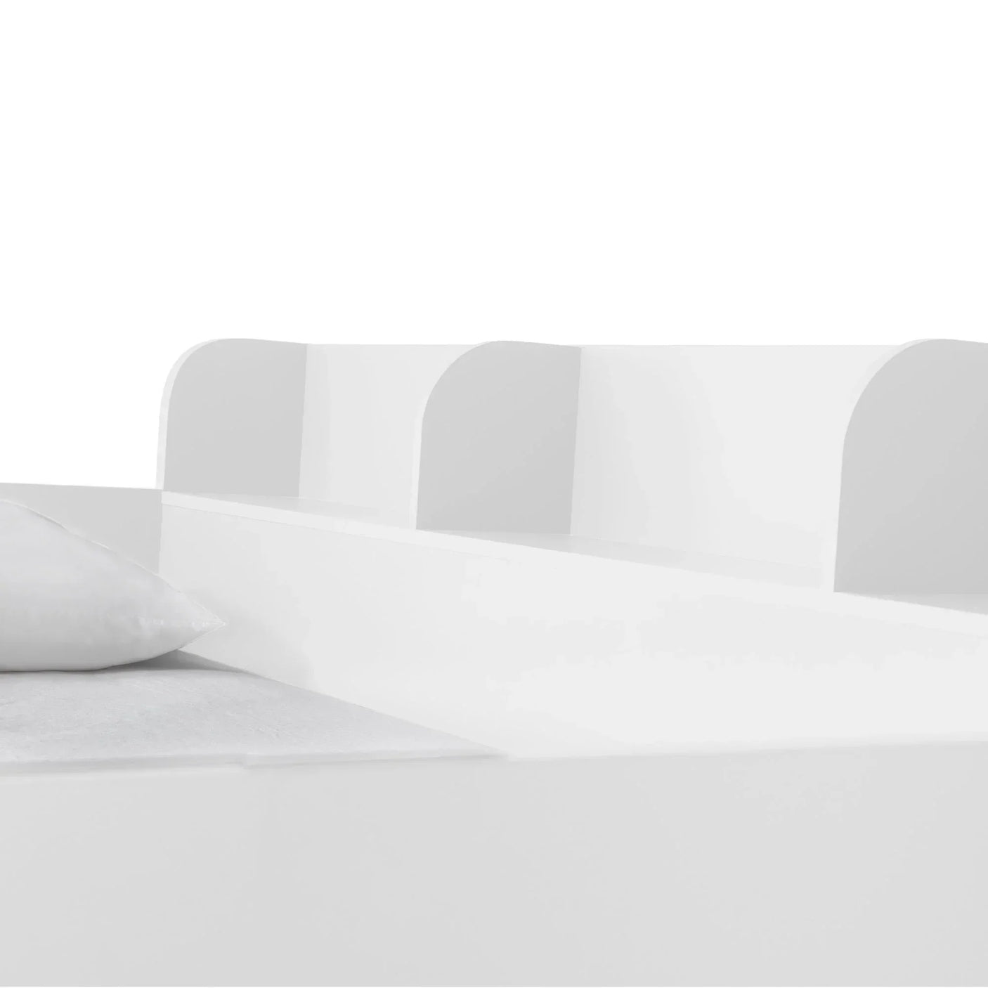 White wooden triple sleeper bed top detail with pillow and built-in shelf sections