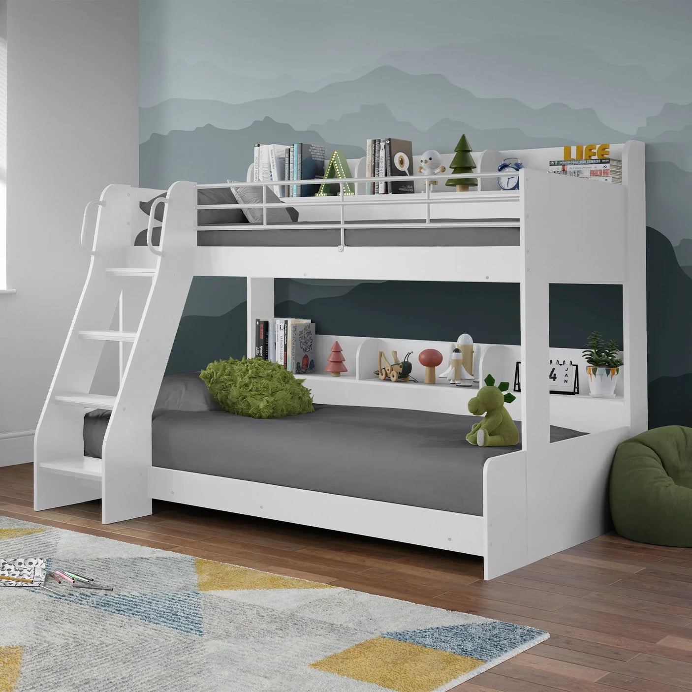 White Domino triple sleeper bunk bed with shelves, grey bedding, toys and books in modern kids room