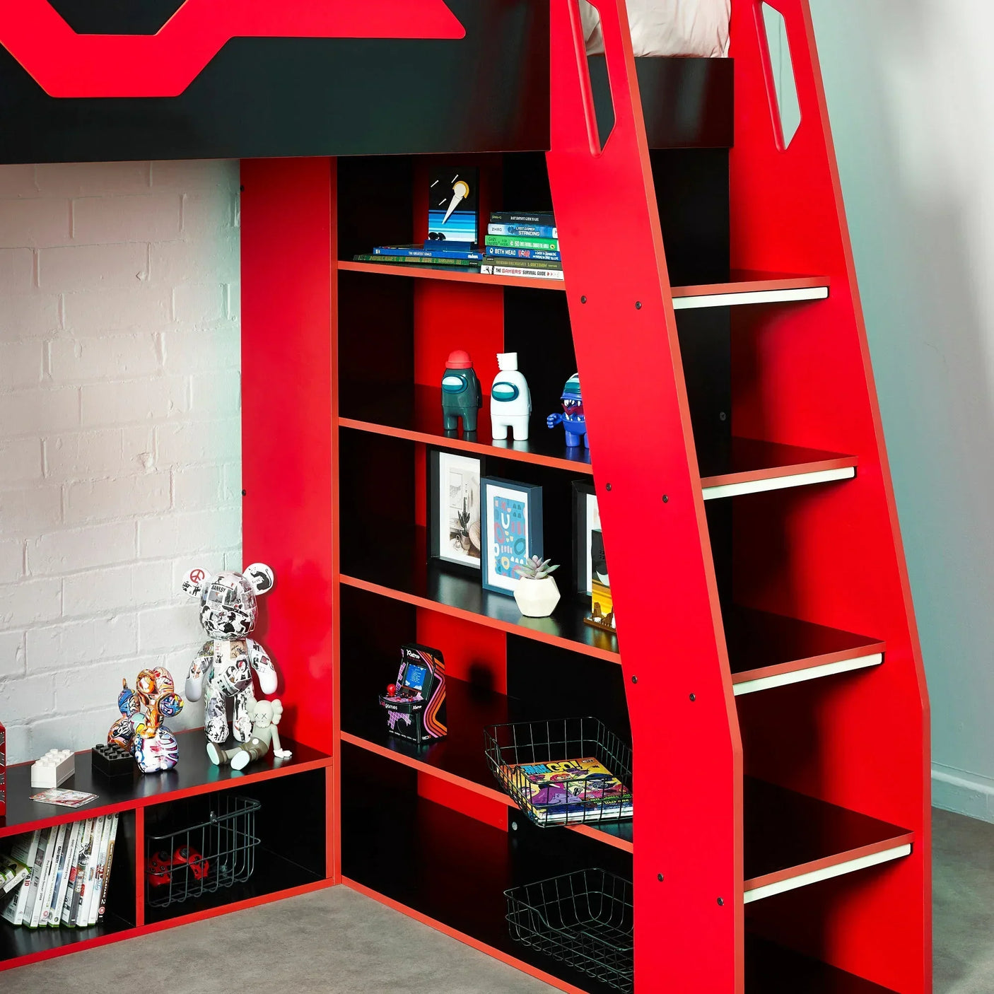 Red and black bunk bed with built-in shelving and ladder for kids bedroom storage