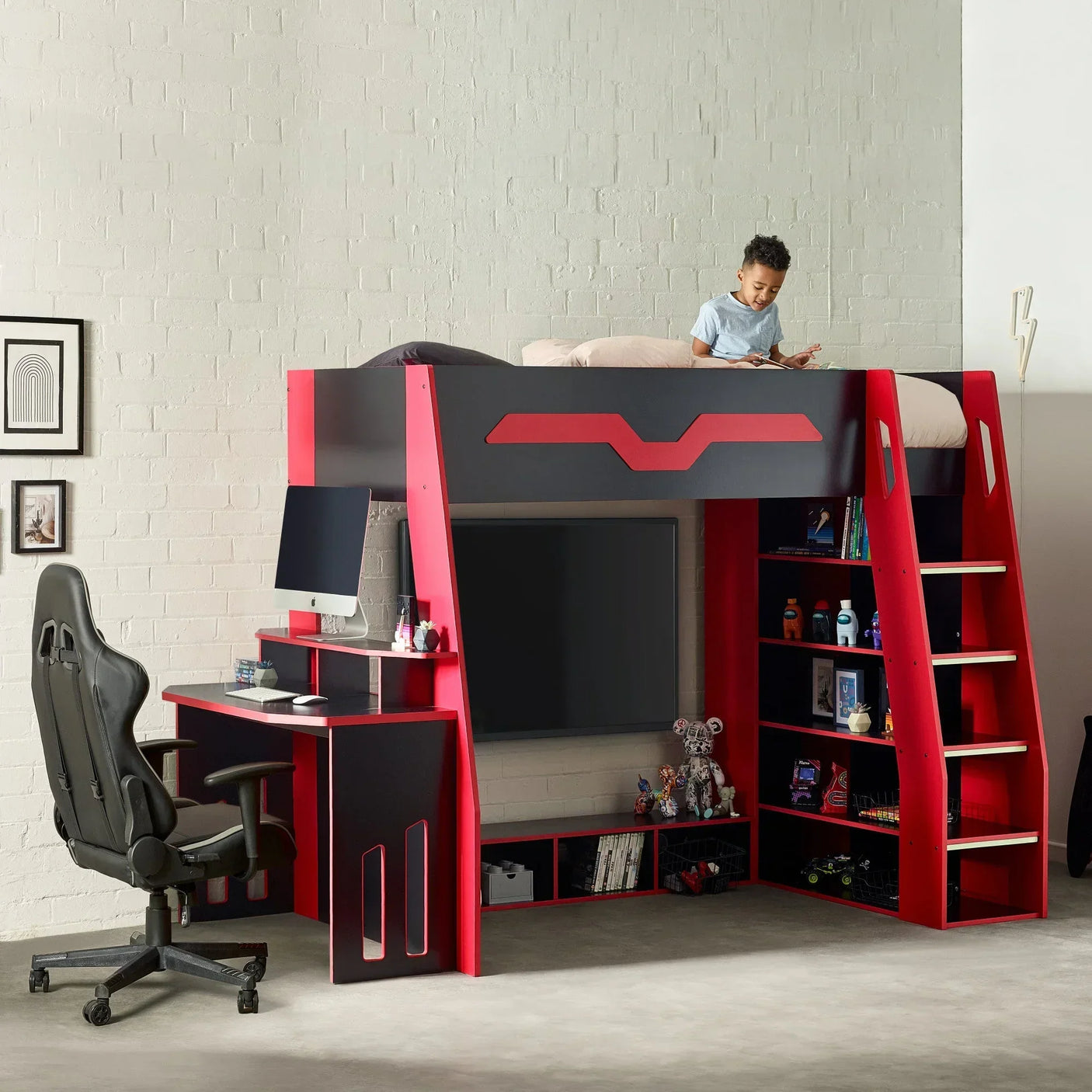 Red and black gaming bunk bed with stairs, built-in desk, shelving and TV space
