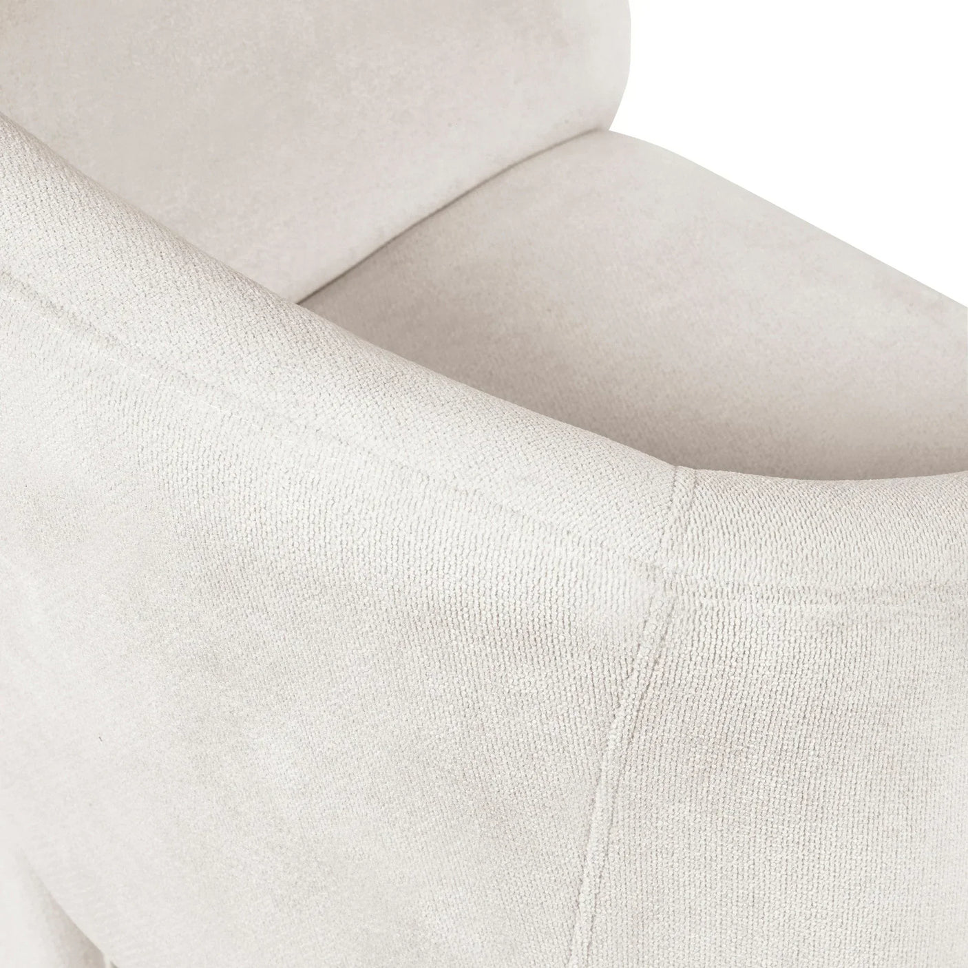 Close-up of cream fabric armchair upholstery and stitching detail