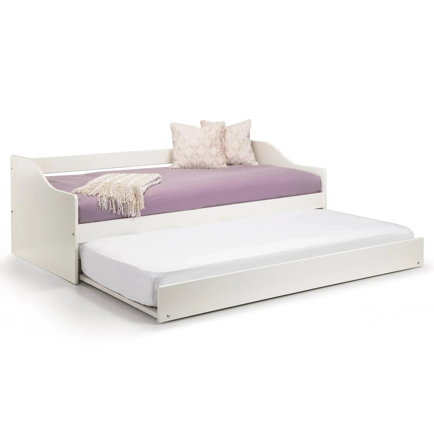 White single daybed with pull-out trundle, lavender bedding, and two textured cushions
