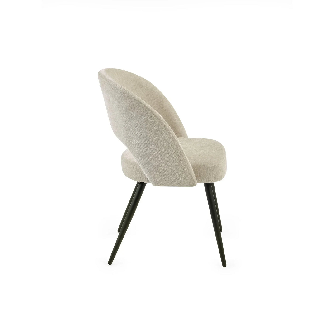 Cream fabric dining chair with curved back and black angled legs side view