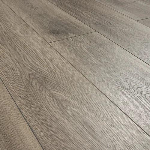 Espresso oak wood flooring with natural grain and matte finish, close-up angled view